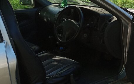 Mitsubishi Mirage VI рестайлинг, 1998 год, 290 000 рублей, 10 фотография