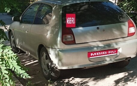 Mitsubishi Mirage VI рестайлинг, 1998 год, 290 000 рублей, 9 фотография