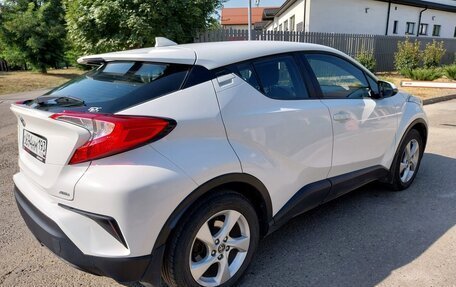 Toyota C-HR I рестайлинг, 2019 год, 2 150 000 рублей, 7 фотография