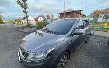 KIA Rio III рестайлинг, 2012 год, 750 000 рублей, 2 фотография