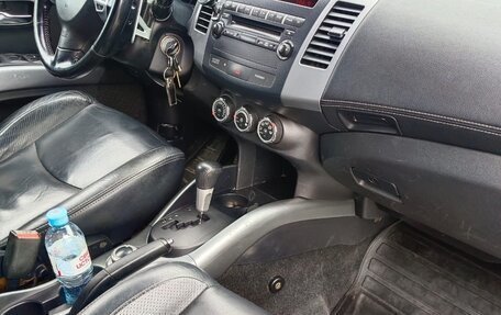 Mitsubishi Outlander III рестайлинг 3, 2010 год, 900 000 рублей, 3 фотография