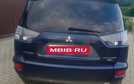 Mitsubishi Outlander III рестайлинг 3, 2010 год, 900 000 рублей, 13 фотография