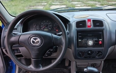 Mazda Protege, 2003 год, 300 000 рублей, 11 фотография