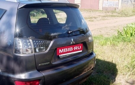 Mitsubishi Outlander III рестайлинг 3, 2010 год, 1 050 000 рублей, 18 фотография