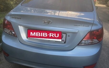 Hyundai Solaris II рестайлинг, 2013 год, 670 000 рублей, 2 фотография