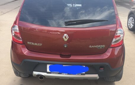 Renault Sandero I, 2013 год, 750 000 рублей, 2 фотография