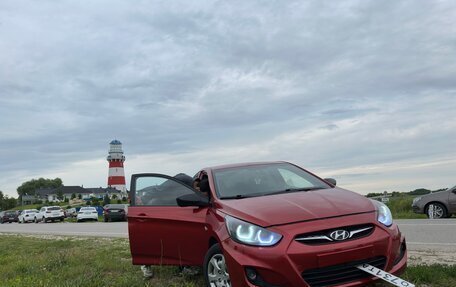 Hyundai Solaris II рестайлинг, 2011 год, 700 000 рублей, 13 фотография