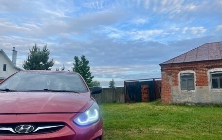 Hyundai Solaris II рестайлинг, 2011 год, 700 000 рублей, 14 фотография