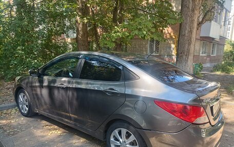 Hyundai Solaris II рестайлинг, 2011 год, 650 000 рублей, 8 фотография