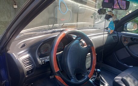 Subaru Outback IV рестайлинг, 1998 год, 220 000 рублей, 10 фотография