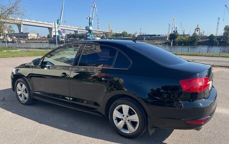 Volkswagen Jetta VI, 2012 год, 999 000 рублей, 2 фотография