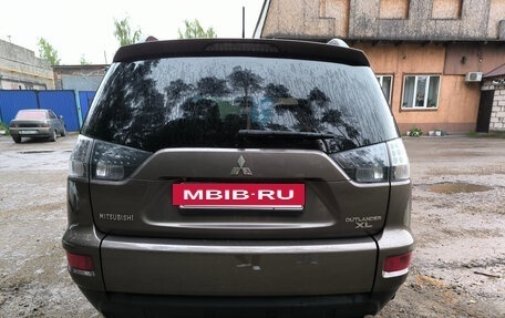Mitsubishi Outlander III рестайлинг 3, 2011 год, 1 350 000 рублей, 2 фотография