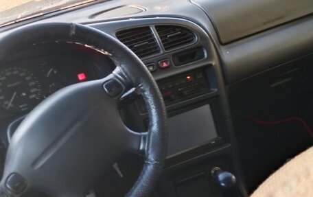Mazda 323, 1996 год, 170 000 рублей, 5 фотография