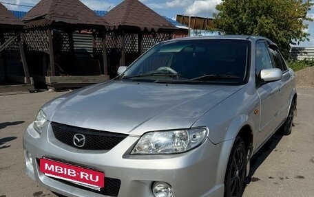 Mazda Familia, 2003 год, 290 000 рублей, 9 фотография