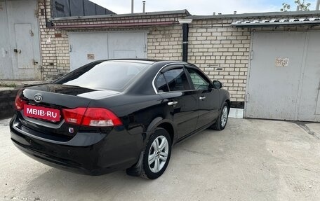 KIA Magentis II рестайлинг, 2010 год, 750 000 рублей, 13 фотография