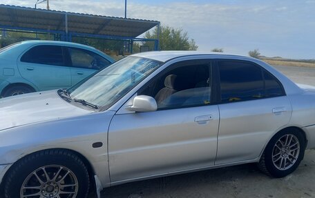 Mitsubishi Lancer VII, 1995 год, 220 000 рублей, 2 фотография