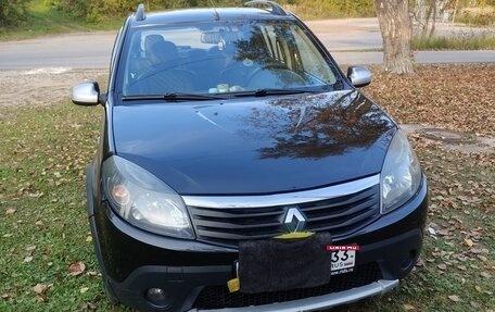 Renault Sandero I, 2013 год, 900 000 рублей, 1 фотография