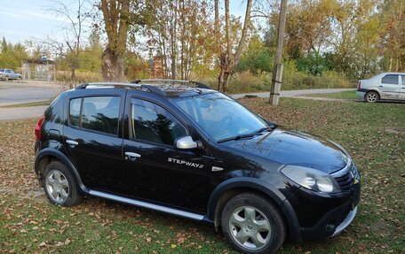 Renault Sandero I, 2013 год, 900 000 рублей, 5 фотография