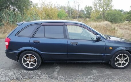 Mazda 323, 1999 год, 280 000 рублей, 7 фотография