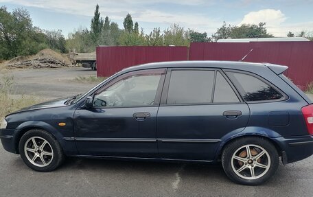 Mazda 323, 1999 год, 280 000 рублей, 11 фотография