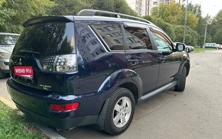 Mitsubishi Outlander III рестайлинг 3, 2010 год, 829 999 рублей, 4 фотография