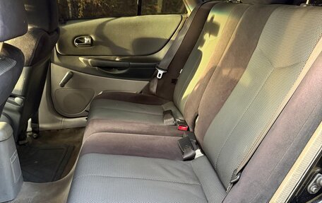 Mazda 323, 2002 год, 330 000 рублей, 9 фотография