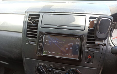Nissan Tiida, 2011 год, 550 000 рублей, 30 фотография