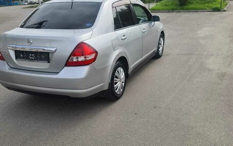 Nissan Tiida, 2004 год, 530 000 рублей, 32 фотография