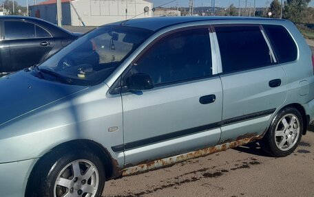 Mitsubishi Space Star I рестайлинг, 2004 год, 150 000 рублей, 12 фотография