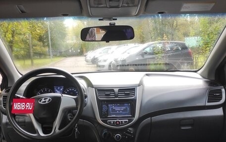 Hyundai Solaris II рестайлинг, 2011 год, 640 000 рублей, 14 фотография