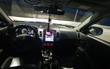 Mitsubishi Outlander III рестайлинг 3, 2011 год, 1 700 000 рублей, 19 фотография