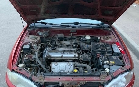 Mitsubishi Mirage VI рестайлинг, 1999 год, 279 000 рублей, 8 фотография