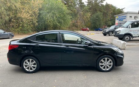 Hyundai Solaris II рестайлинг, 2011 год, 700 000 рублей, 4 фотография