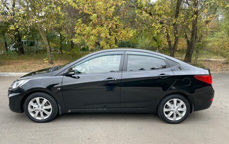 Hyundai Solaris II рестайлинг, 2011 год, 700 000 рублей, 7 фотография