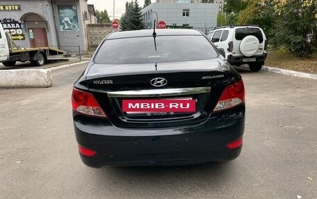 Hyundai Solaris II рестайлинг, 2011 год, 700 000 рублей, 6 фотография
