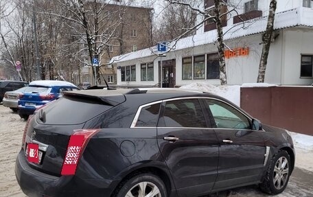 Cadillac SRX II рестайлинг, 2011 год, 1 300 000 рублей, 1 фотография