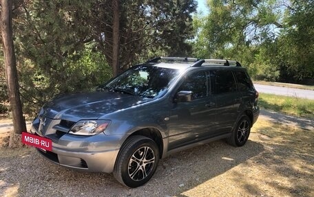 Mitsubishi Outlander III рестайлинг 3, 2003 год, 680 000 рублей, 2 фотография