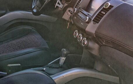 Mitsubishi Outlander III рестайлинг 3, 2010 год, 1 550 000 рублей, 20 фотография