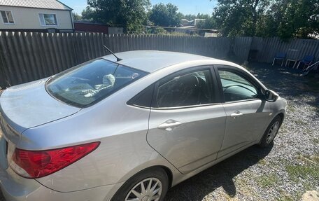 Hyundai Solaris II рестайлинг, 2011 год, 650 000 рублей, 3 фотография