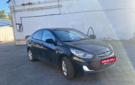 Hyundai Solaris II рестайлинг, 2011 год, 750 000 рублей, 4 фотография