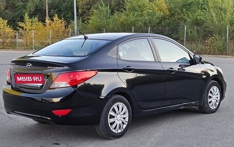 Hyundai Solaris II рестайлинг, 2011 год, 670 000 рублей, 2 фотография
