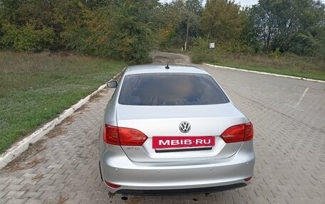 Volkswagen Jetta VI, 2013 год, 900 000 рублей, 7 фотография