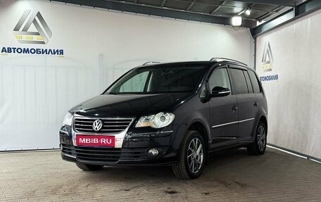 Volkswagen Touran III, 2010 год, 799 000 рублей, 1 фотография