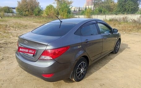 Hyundai Solaris II рестайлинг, 2011 год, 700 000 рублей, 3 фотография