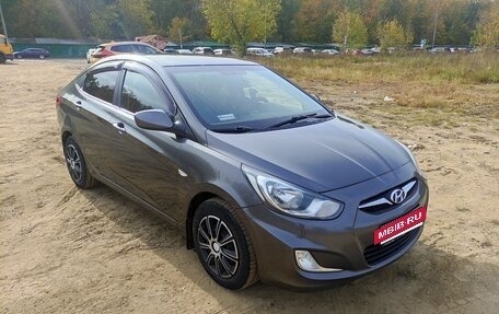 Hyundai Solaris II рестайлинг, 2011 год, 700 000 рублей, 2 фотография