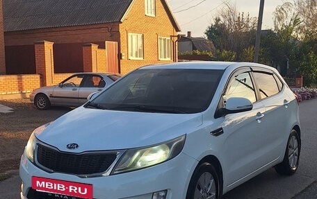 KIA Rio III рестайлинг, 2012 год, 860 000 рублей, 9 фотография