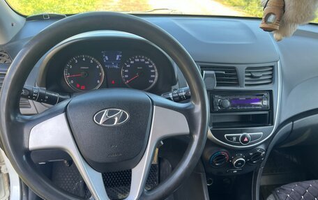 Hyundai Solaris II рестайлинг, 2013 год, 700 000 рублей, 21 фотография