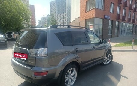 Mitsubishi Outlander III рестайлинг 3, 2010 год, 890 000 рублей, 4 фотография