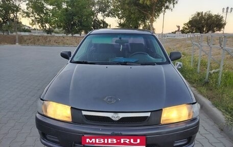 Mazda 323, 1997 год, 230 000 рублей, 7 фотография