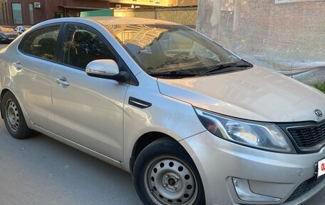 KIA Rio III рестайлинг, 2012 год, 750 000 рублей, 2 фотография